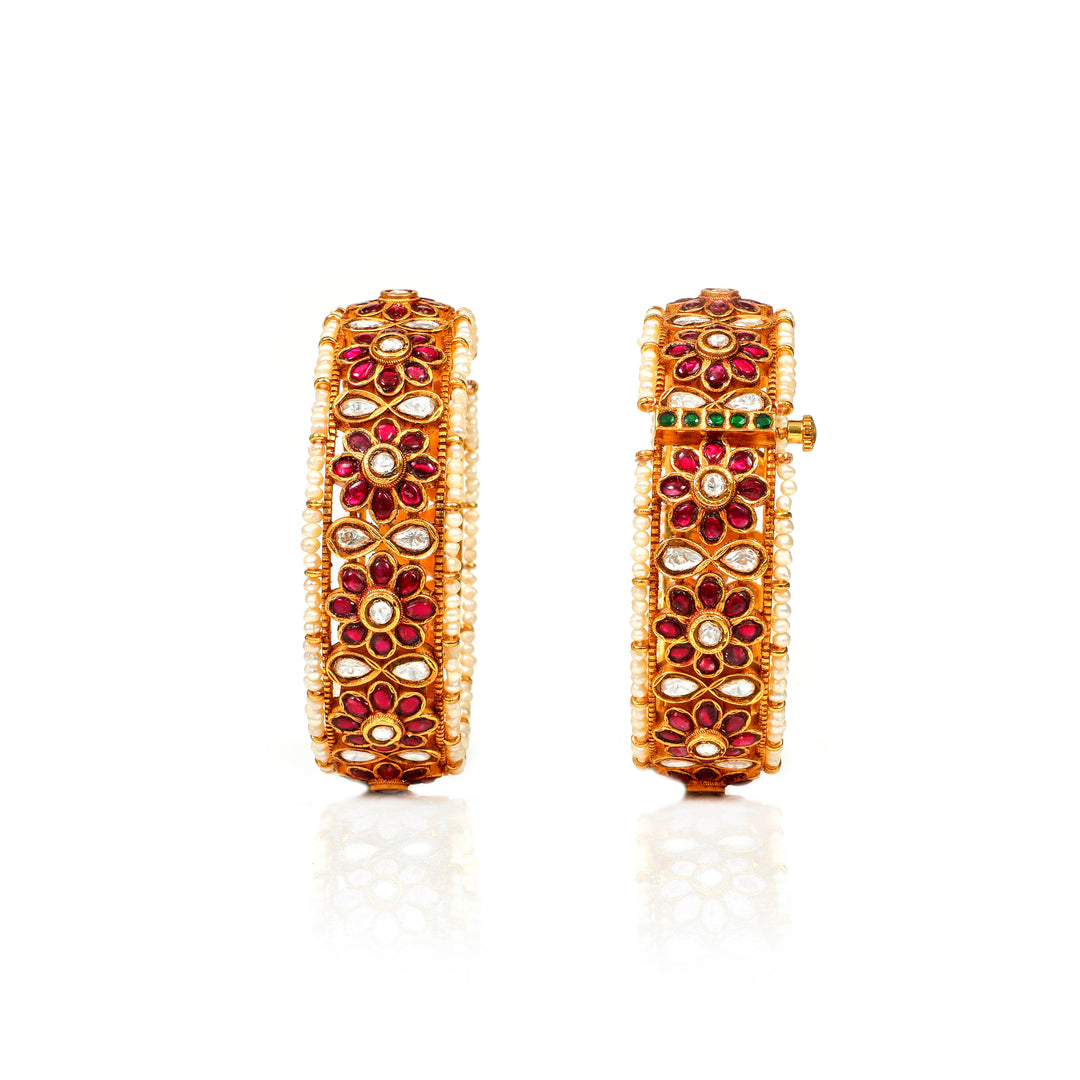 Gulbahar Floral: broad floral bangles with red stones, clear accents and pearl-style edging