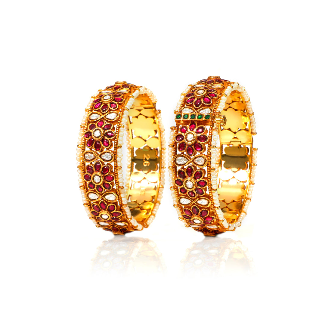 Gulbahar Floral: broad floral bangles with red stones, clear accents and pearl-style edging