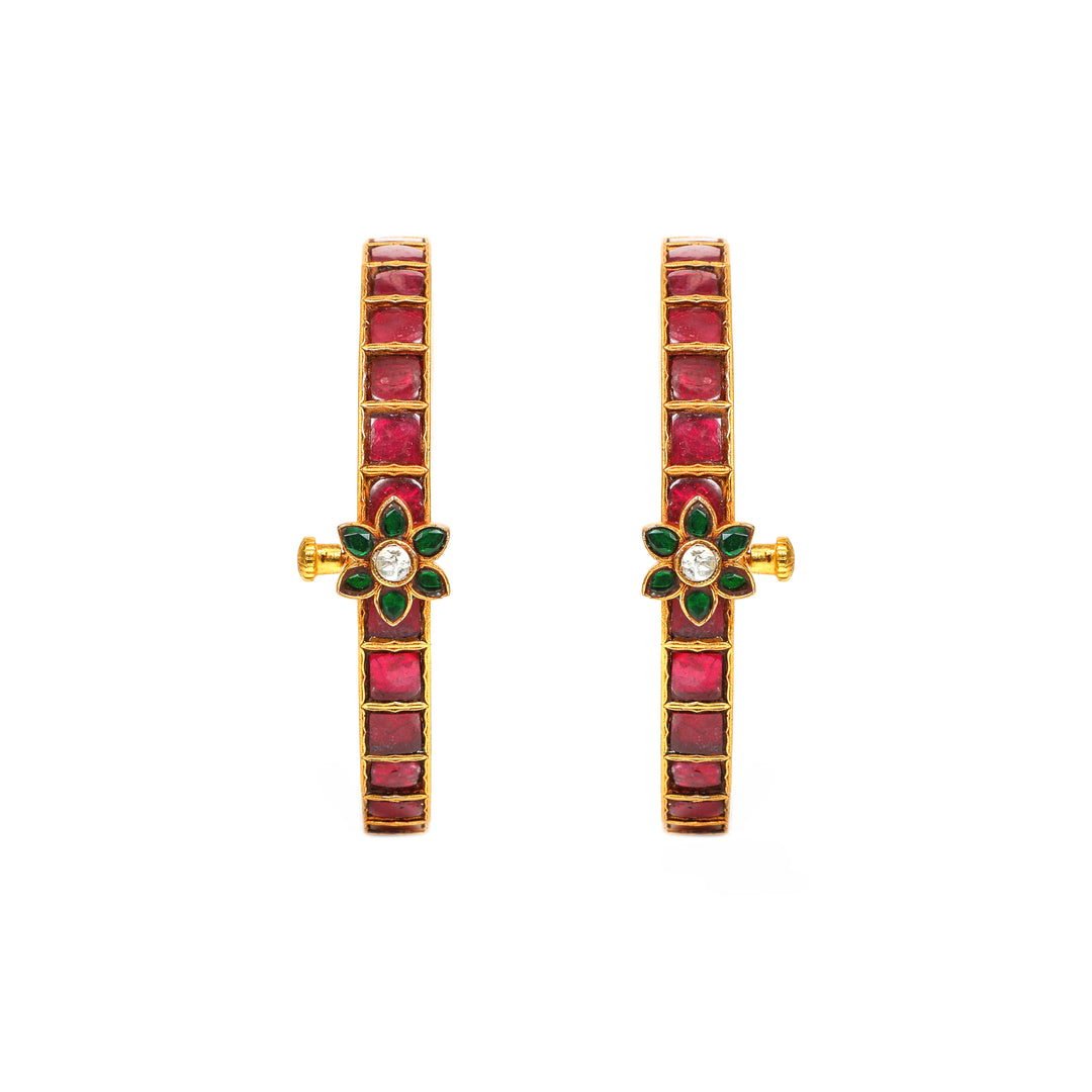 Rangrez Slim: slim red-stone bangles with a green floral accent and clear centre stone