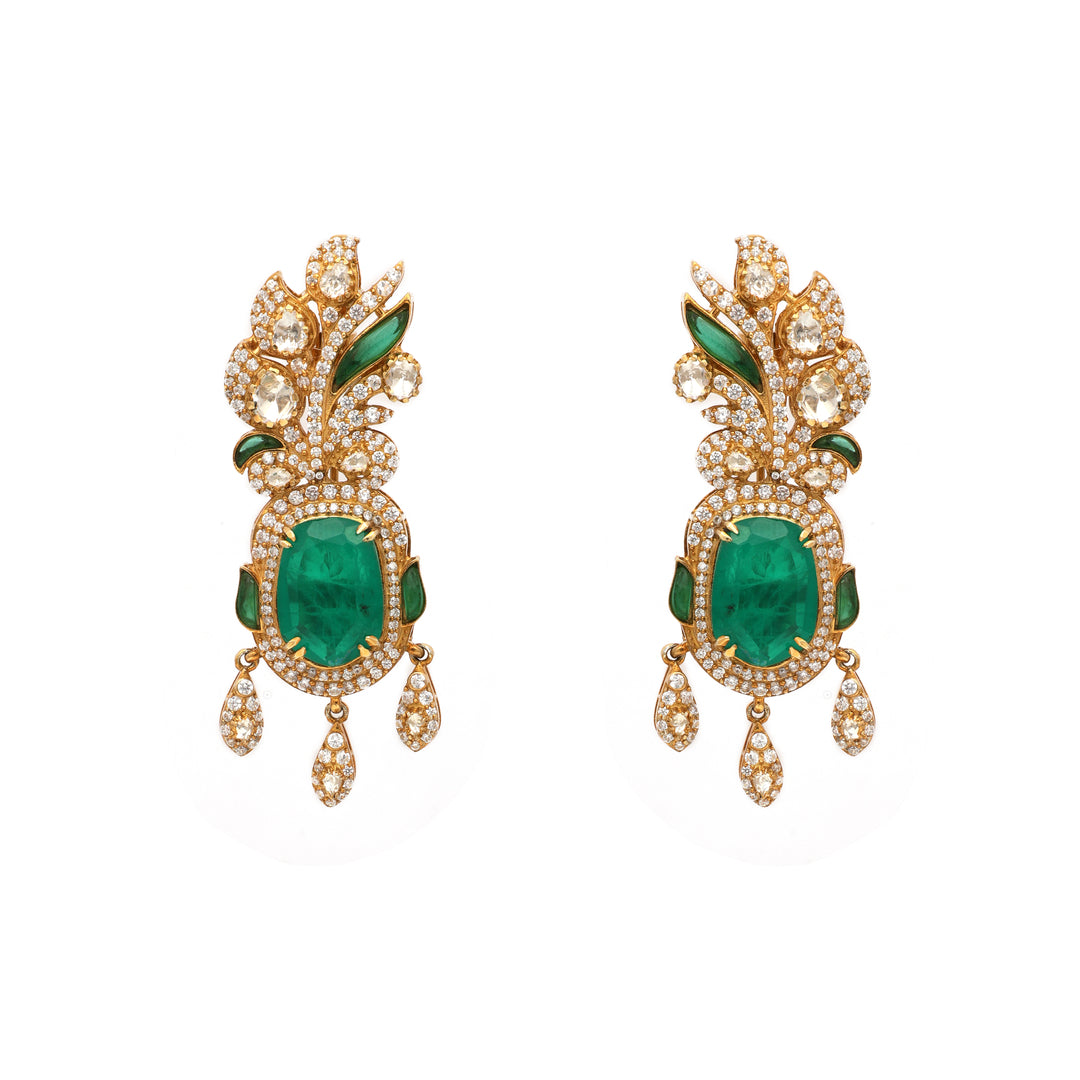 Emerald Rani: ornate drop earrings with green centre stones, clear accents and delicate hanging details