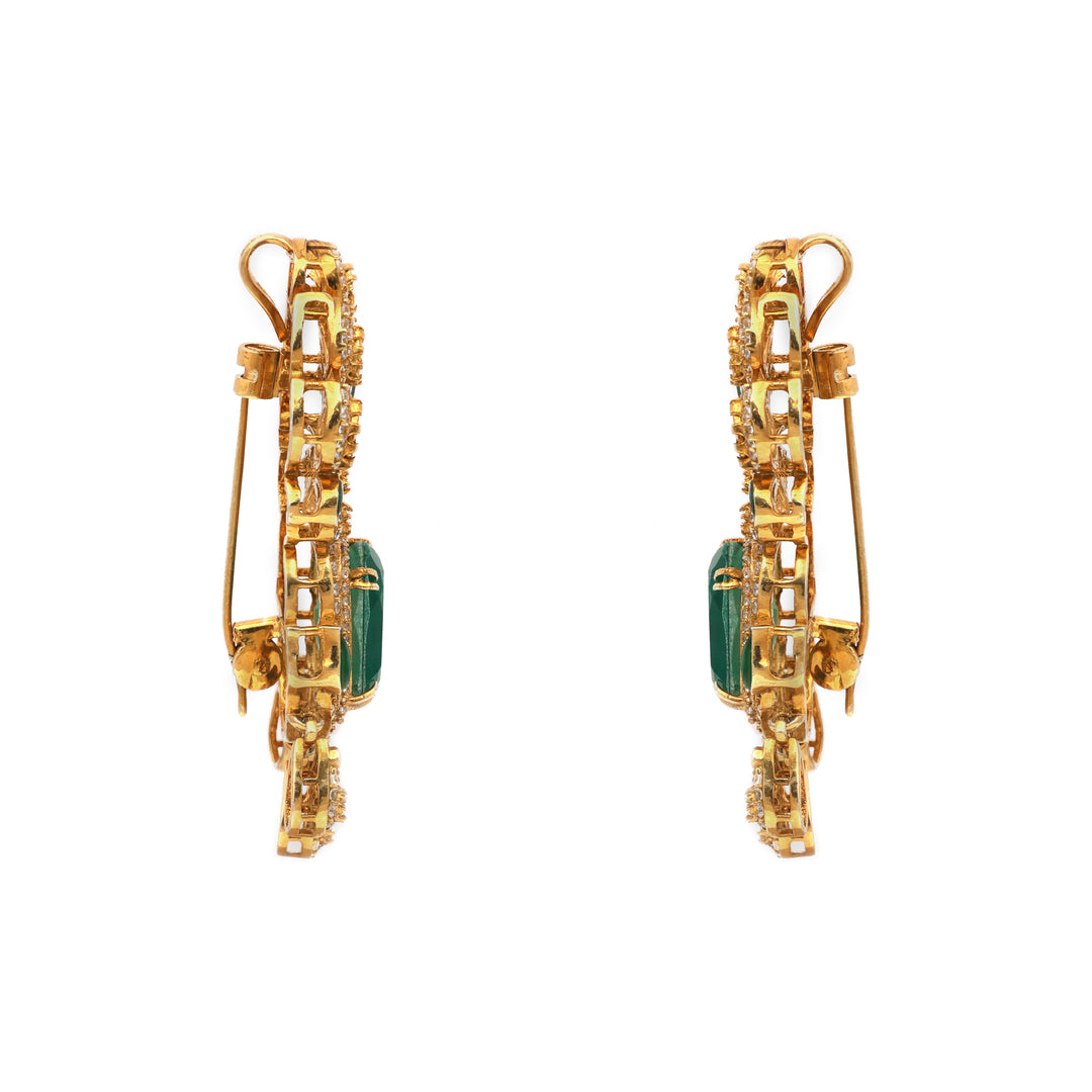 Emerald Rani: ornate drop earrings with green centre stones, clear accents and delicate hanging details