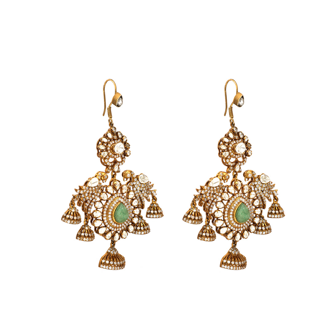 Mughal Jhumka: long chandelier earrings with fine filigree-inspired detailing, green accents and bell-shaped drops