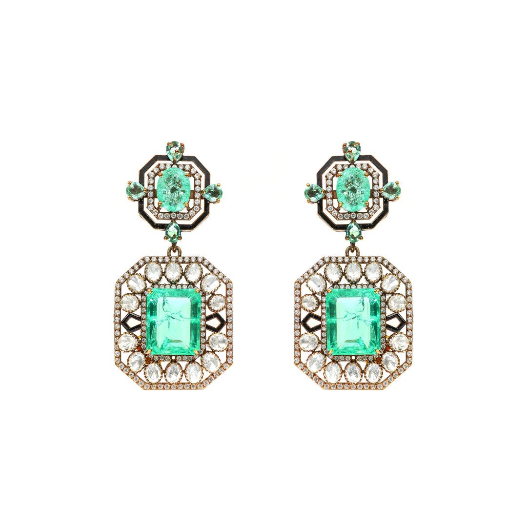 Emerald Square Halo: square green centre stones framed by clear accents and geometric detailing