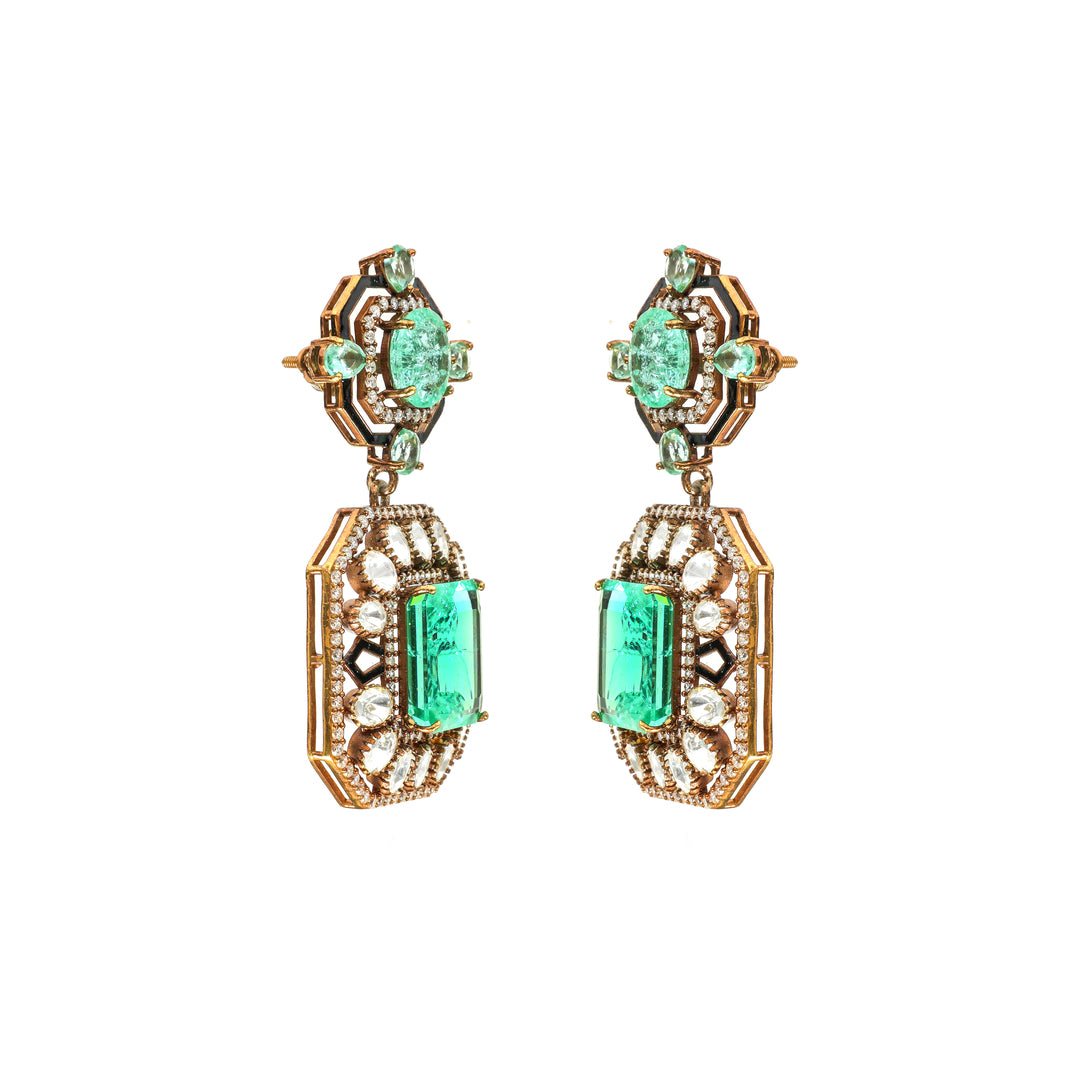 Emerald Square Halo: square green centre stones framed by clear accents and geometric detailing