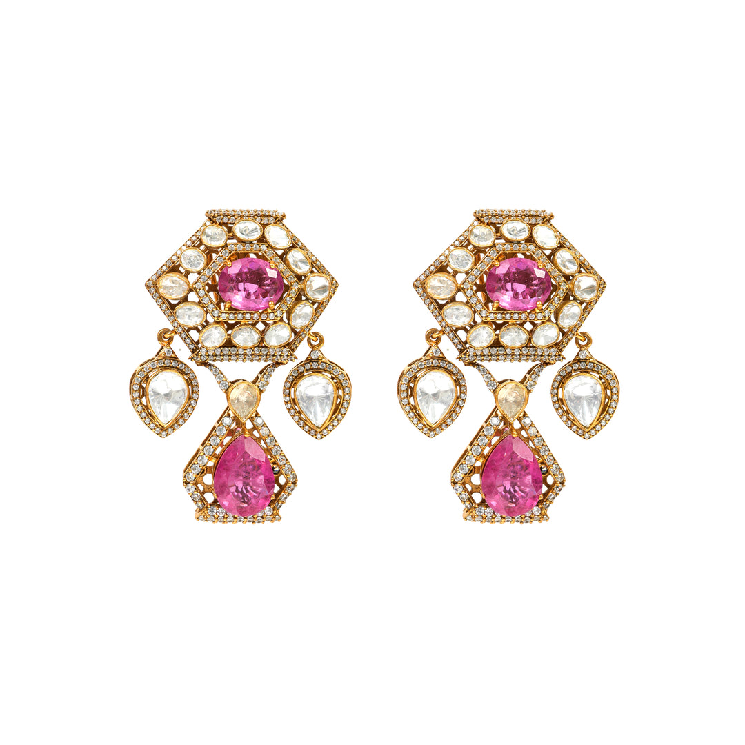 Pink Geometry: geometric earrings with pink centre stones, clear accents and angular gold-tone framing