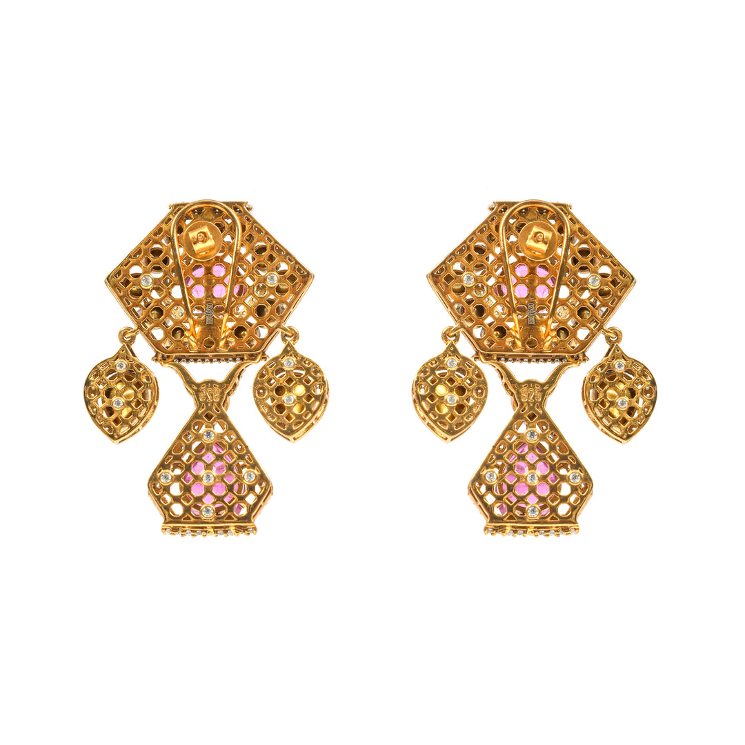 Pink Geometry: geometric earrings with pink centre stones, clear accents and angular gold-tone framing