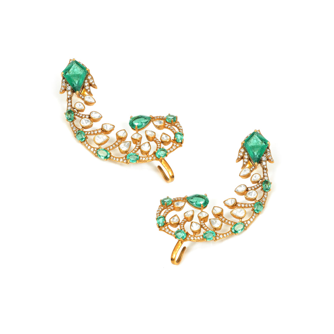 Emerald Feather: curved feather-inspired earrings with green and clear stone accents