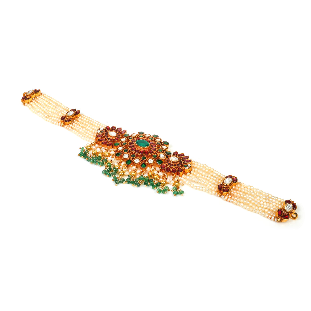 Rajwada Choker: traditional choker with a central red-and-green floral medallion and ornate detailing