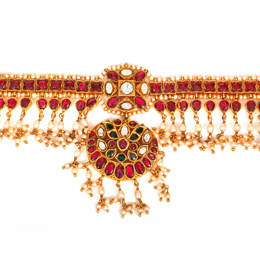 Gulbahar Forehead Ornament: ornamental forehead band with a central floral medallion and red accents