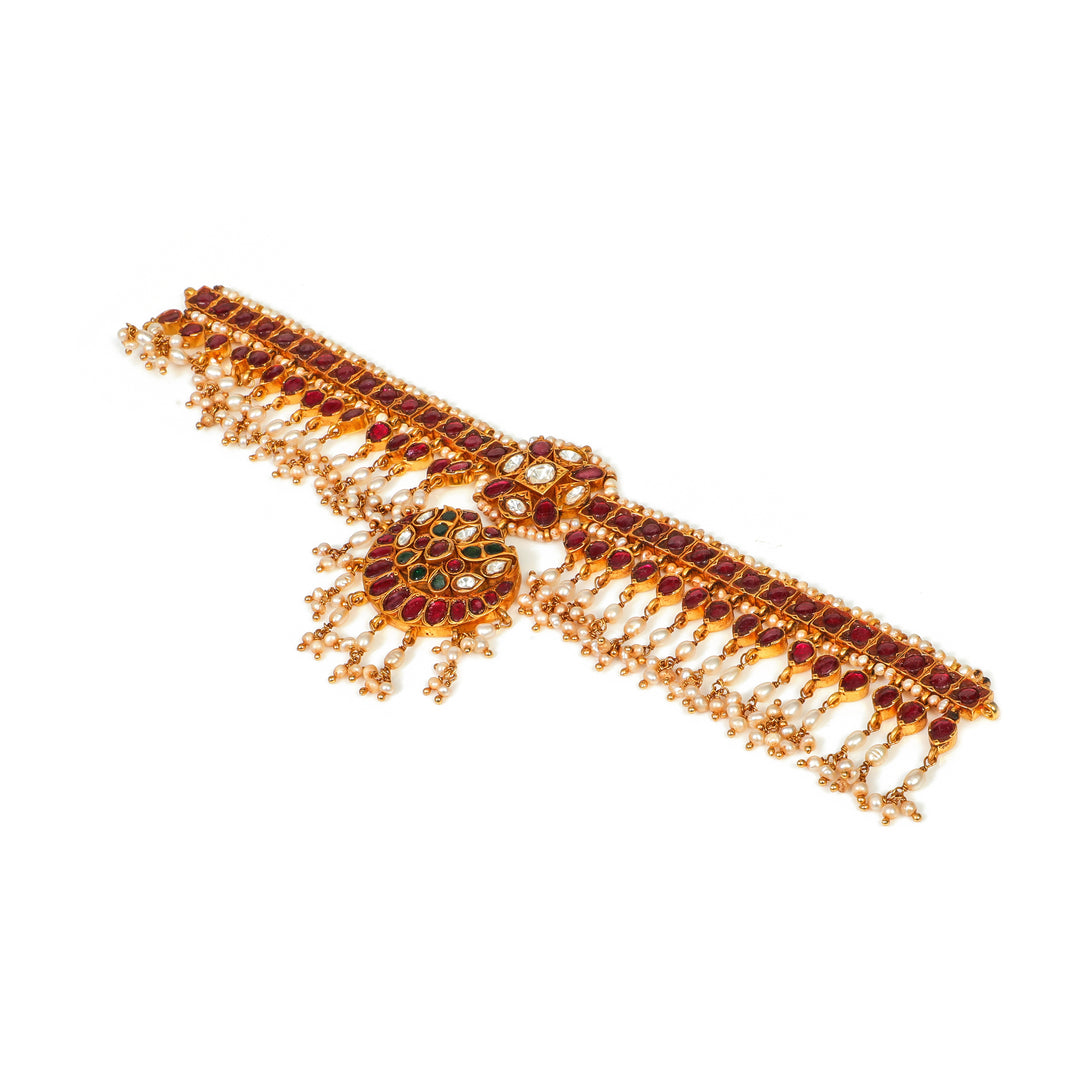 Gulbahar Forehead Ornament: ornamental forehead band with a central floral medallion and red accents