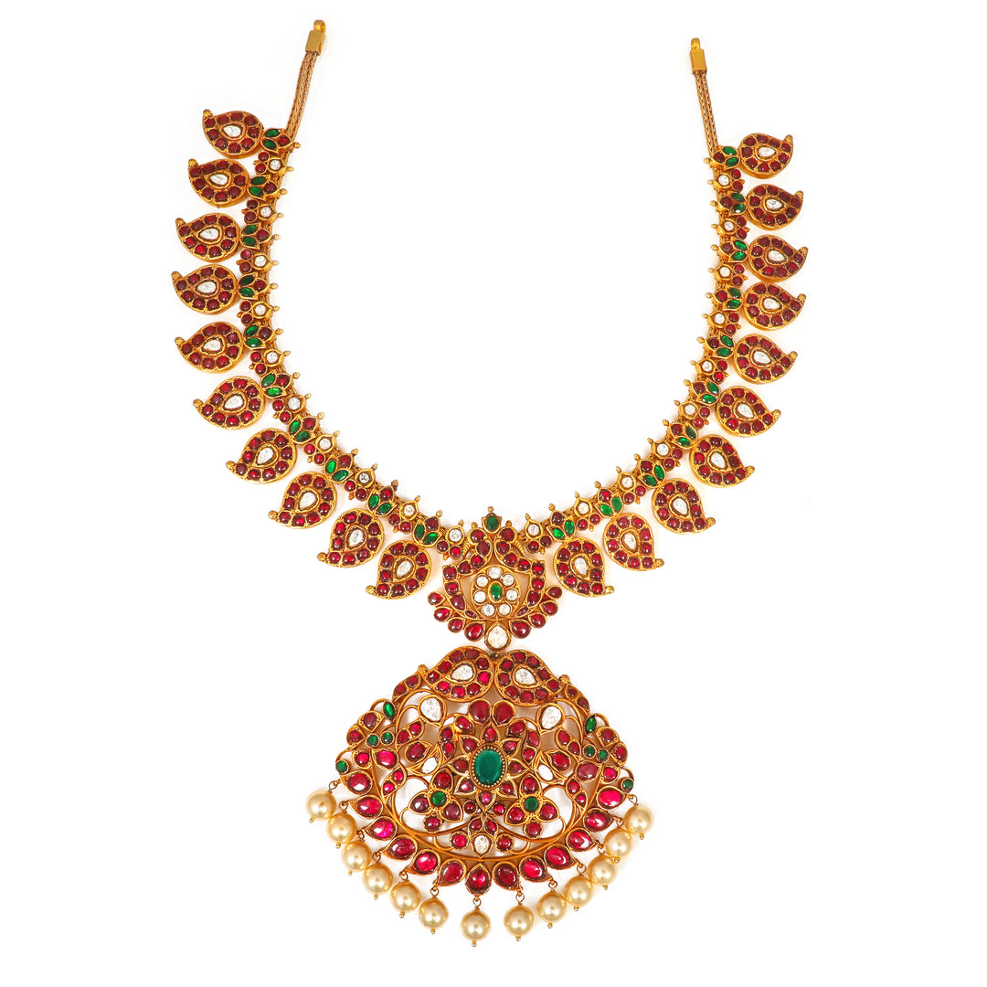 Mughal Teardrop Necklace: ornate necklace with repeating drop motifs and a central teardrop pendant