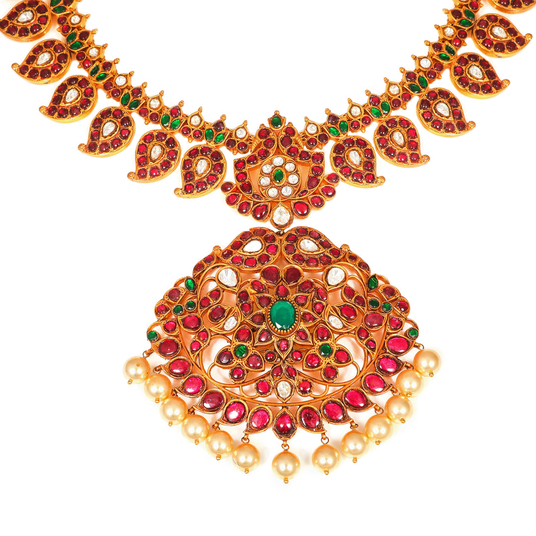 Mughal Teardrop Necklace: ornate necklace with repeating drop motifs and a central teardrop pendant