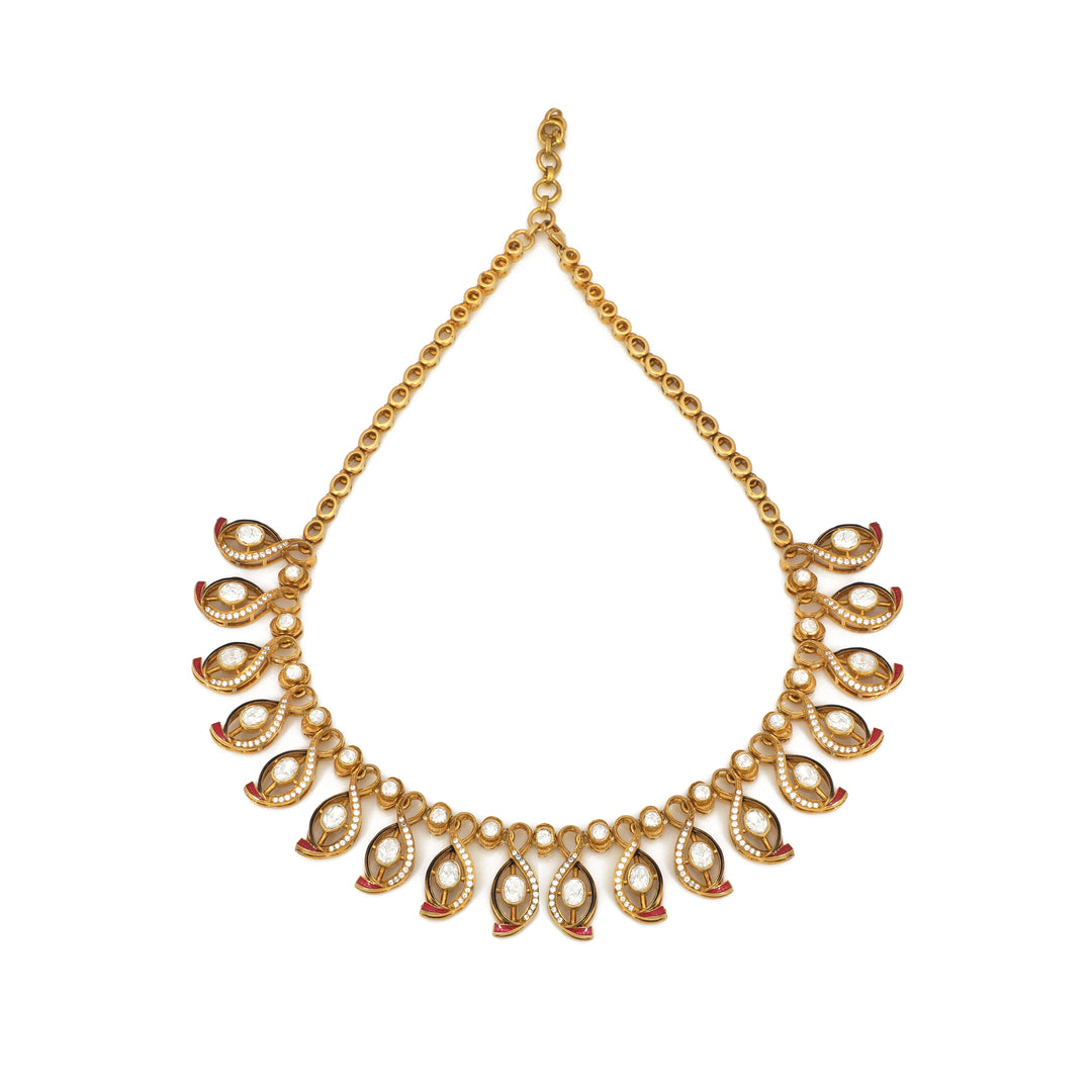 Golden Leaf Fringe: delicate necklace with repeating open leaf-like drops along the lower edge