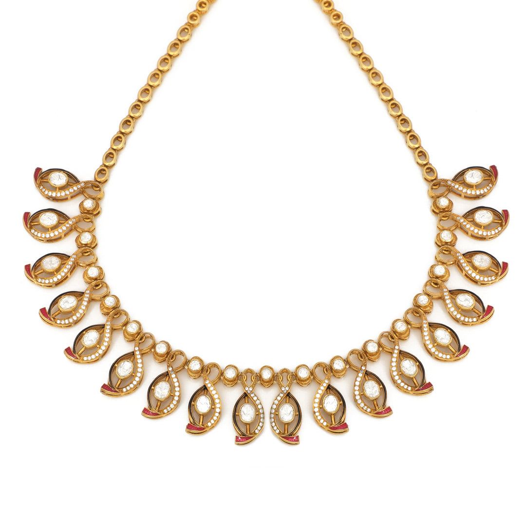 Golden Leaf Fringe: delicate necklace with repeating open leaf-like drops along the lower edge