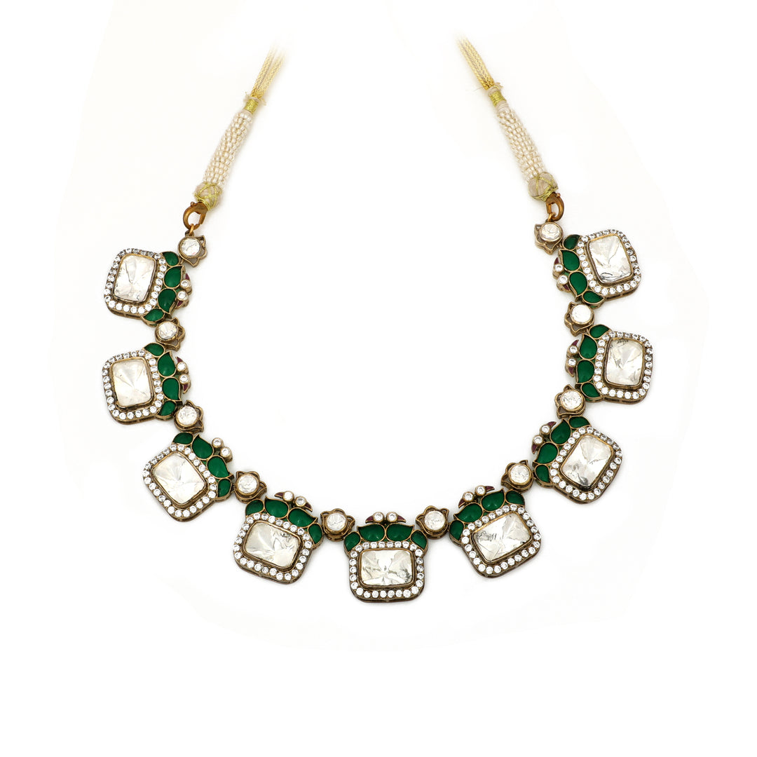 Emerald Geometric Collar: necklace with repeating square green-centred motifs framed by clear accents