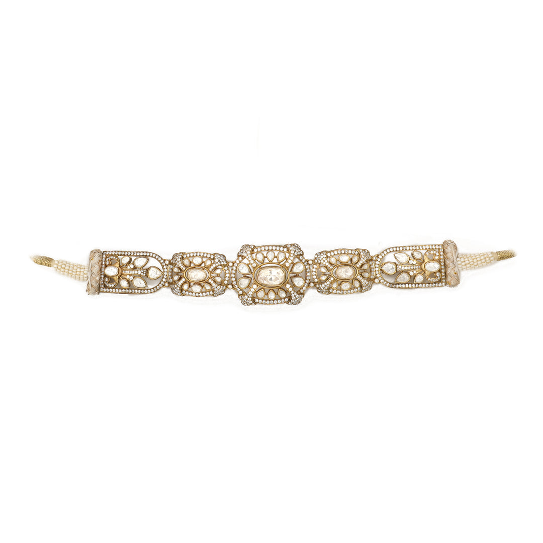 Floral Heritage Bracelet: slender bracelet with repeating floral openwork and clear-stone details