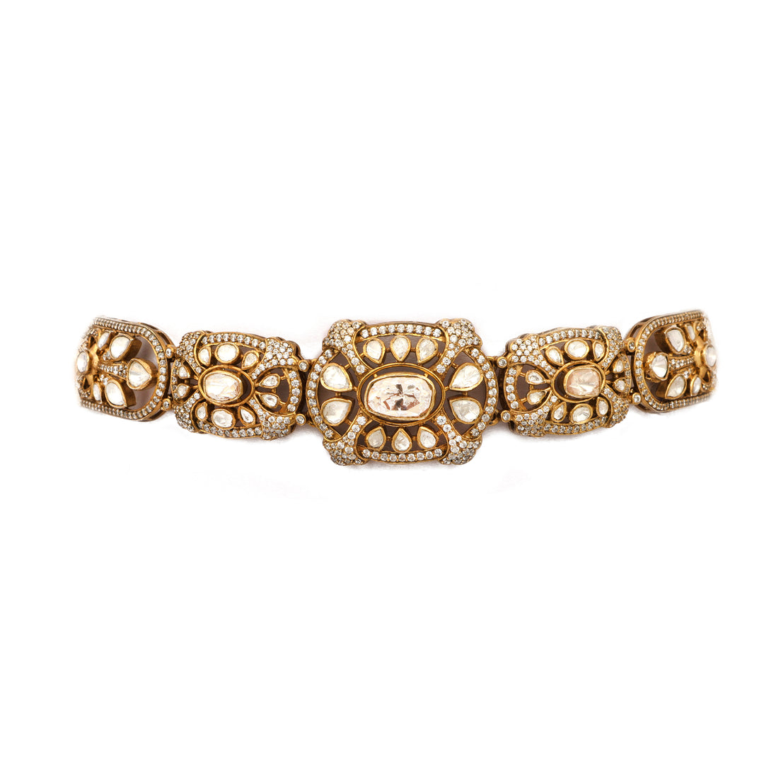 Floral Heritage Bracelet: slender bracelet with repeating floral openwork and clear-stone details