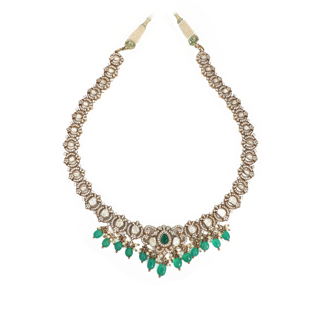 Emerald Fringe Necklace: clear-stone necklace finished with a row of green accents along the lower edge