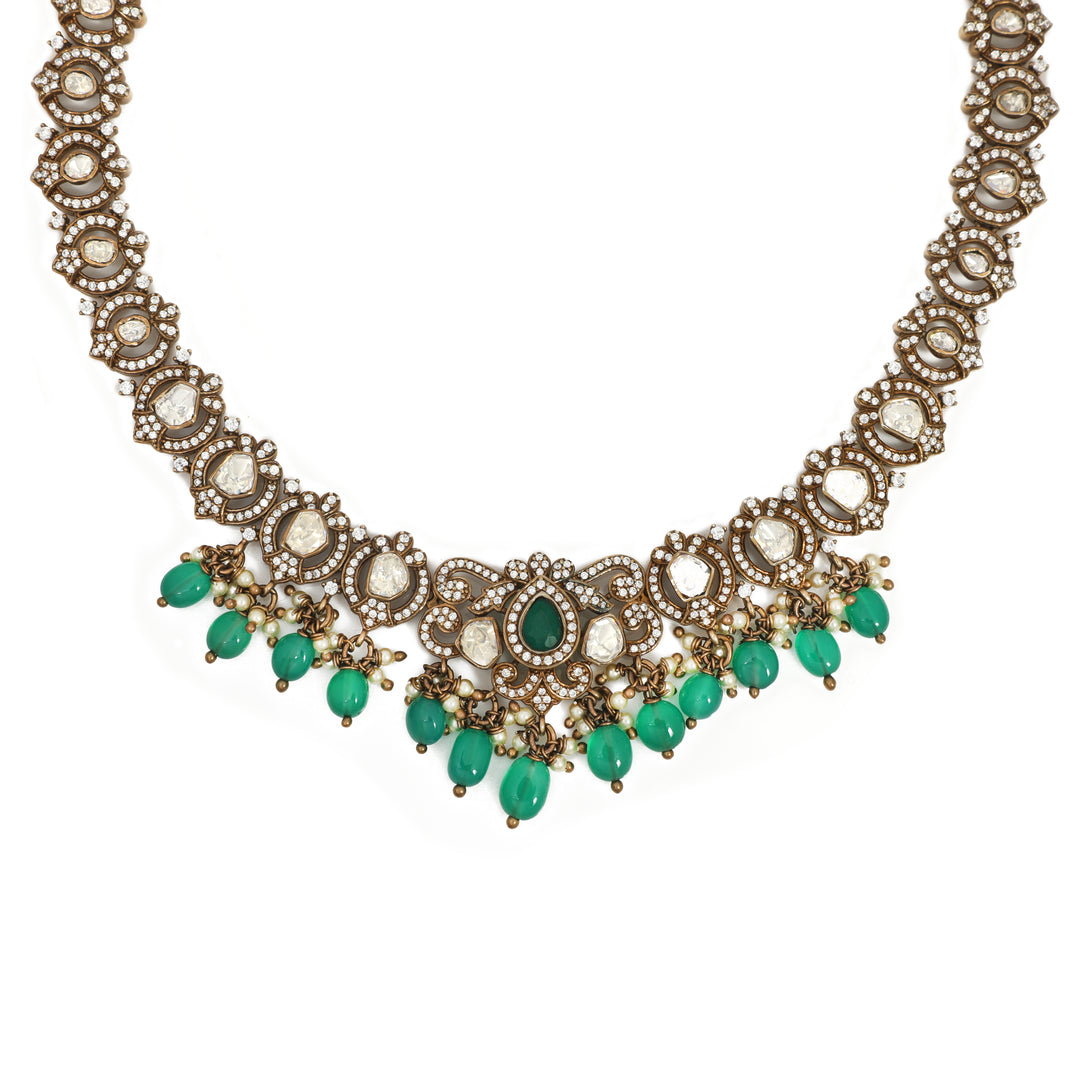 Emerald Fringe Necklace: clear-stone necklace finished with a row of green accents along the lower edge