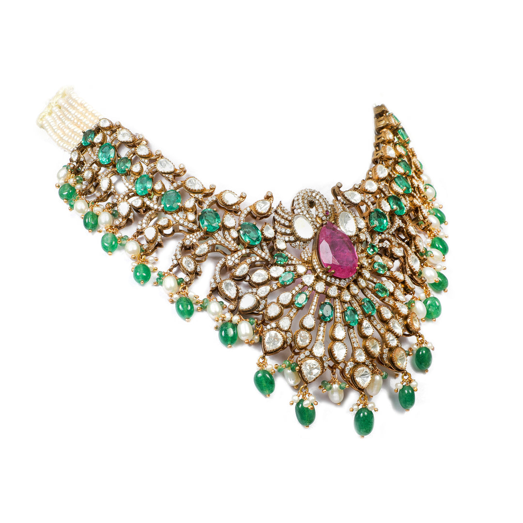 Emerald Rani Statement Necklace: ornate broad necklace with green accents, pink centre details and layered drop motifs