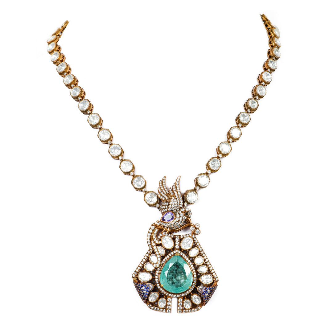 Emerald Teardrop Halo Necklace: necklace with a green teardrop centre, clear accents and a decorative halo