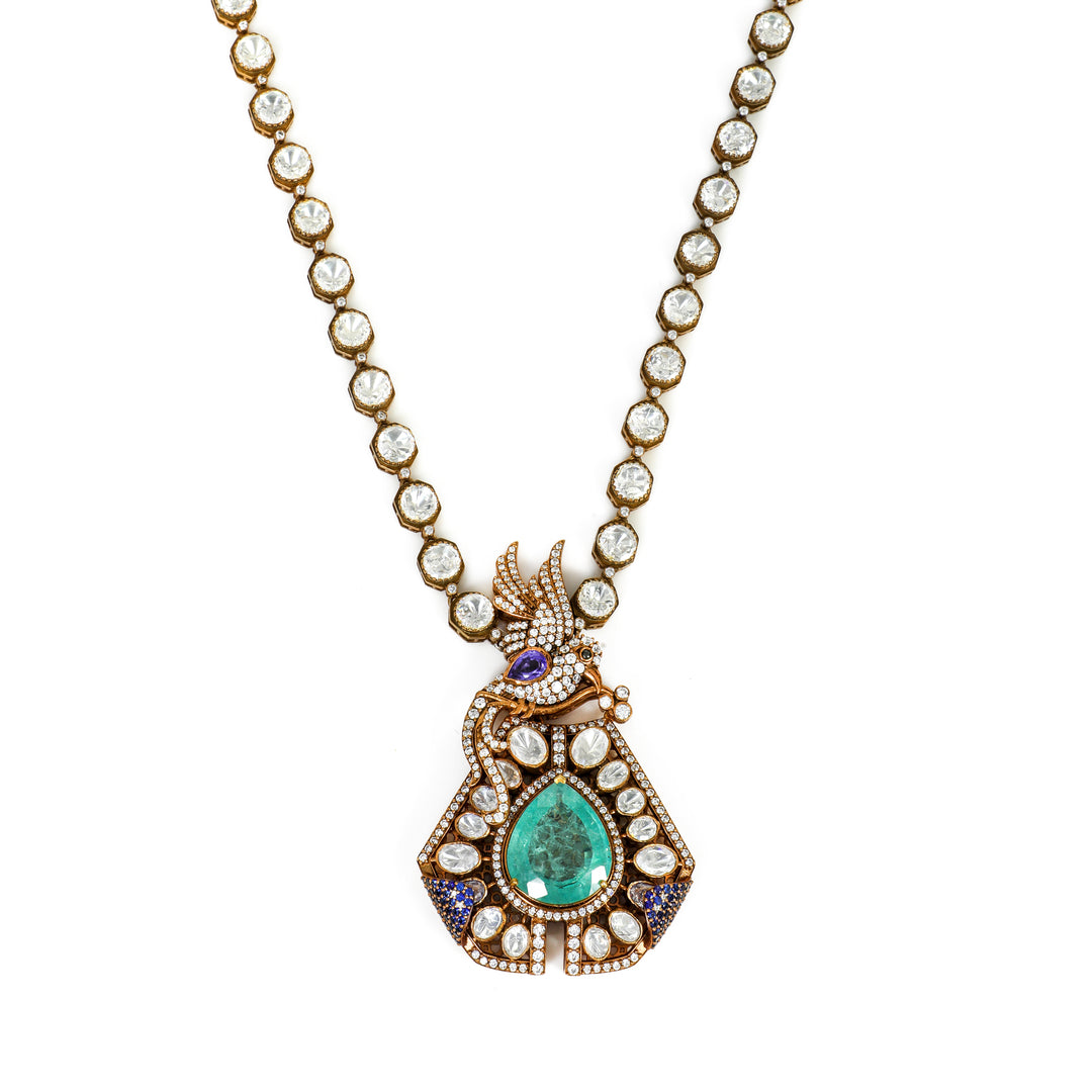Emerald Teardrop Halo Necklace: necklace with a green teardrop centre, clear accents and a decorative halo