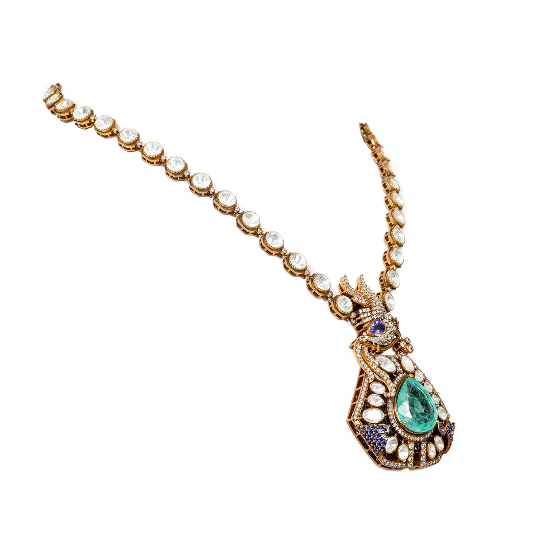 Emerald Teardrop Halo Necklace: necklace with a green teardrop centre, clear accents and a decorative halo