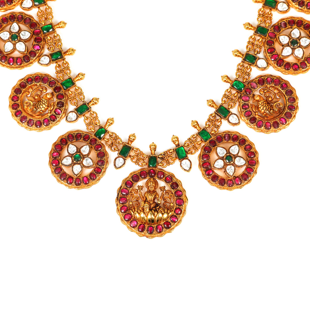 Temple Floral Necklace: traditional temple-style necklace with repeating round floral motifs and green accents